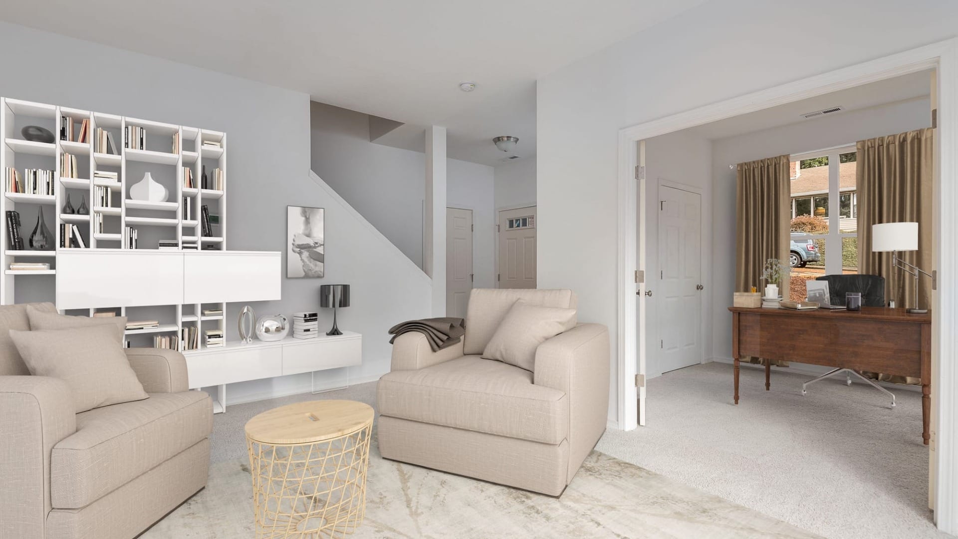 A living room with white walls