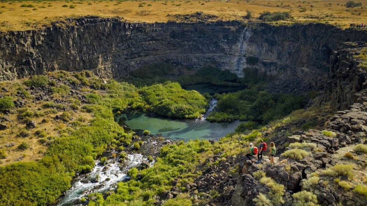 A crater with a lake at the center of it