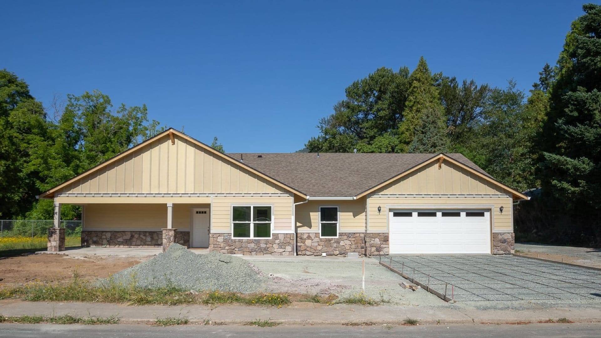 The Oswego Home During The consturction of the driveway