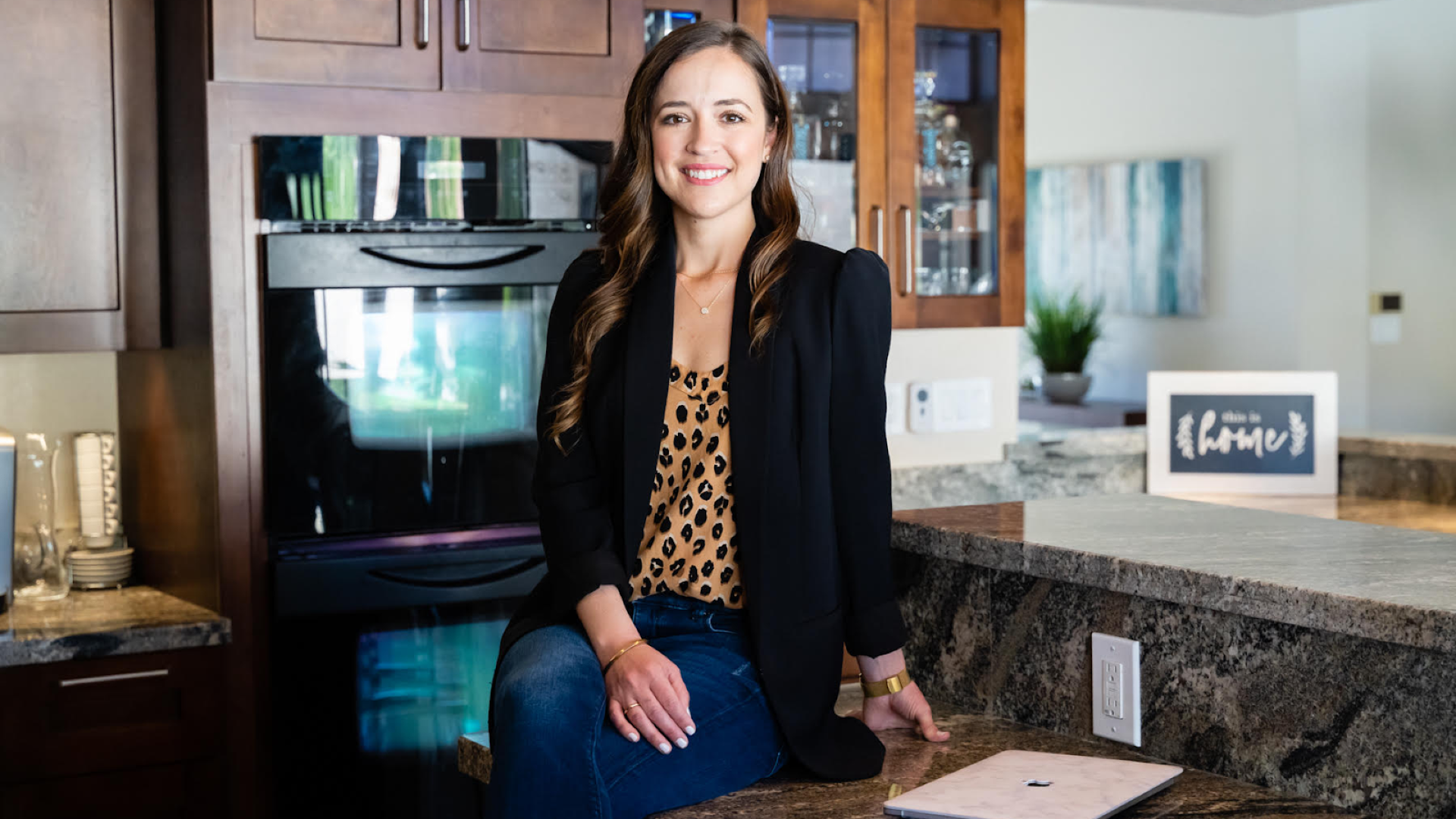 Portrait photo of a realator in a modern kitchen