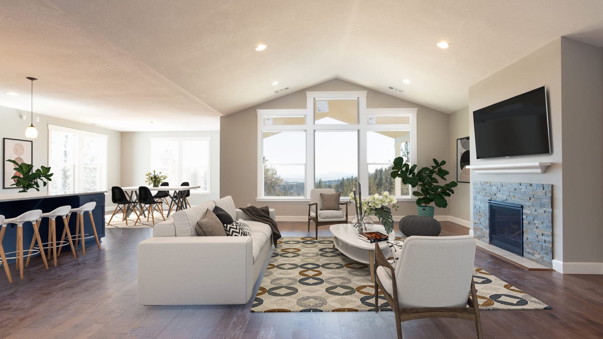 A living room with a dining room next to it