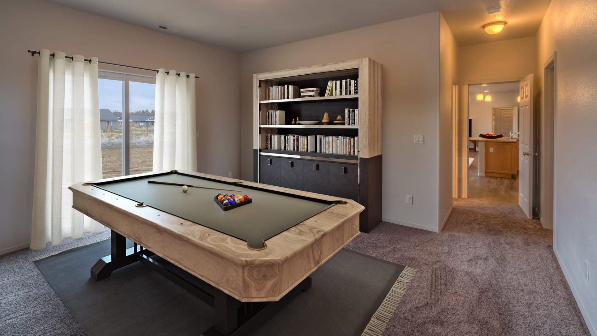 A room with a pool table in it