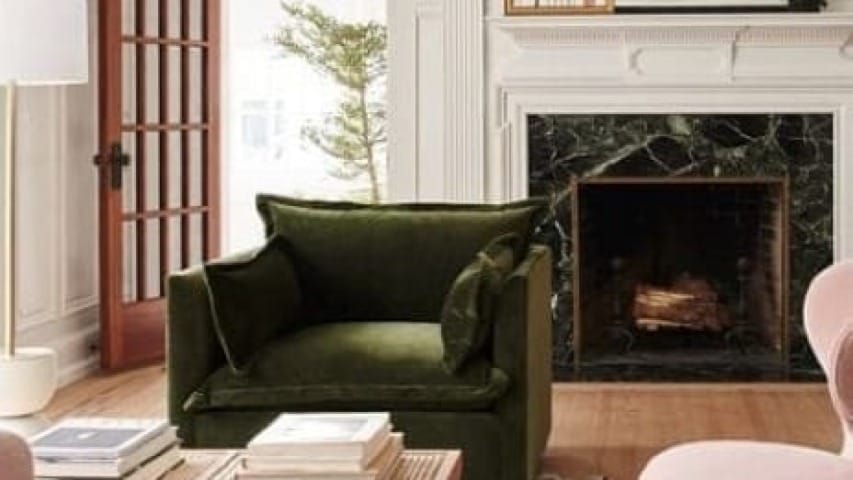 A living room witha green sofa in it