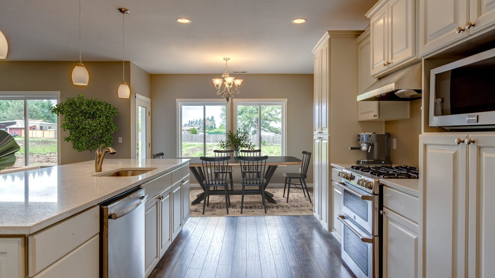 A kitchen with a dining room near it