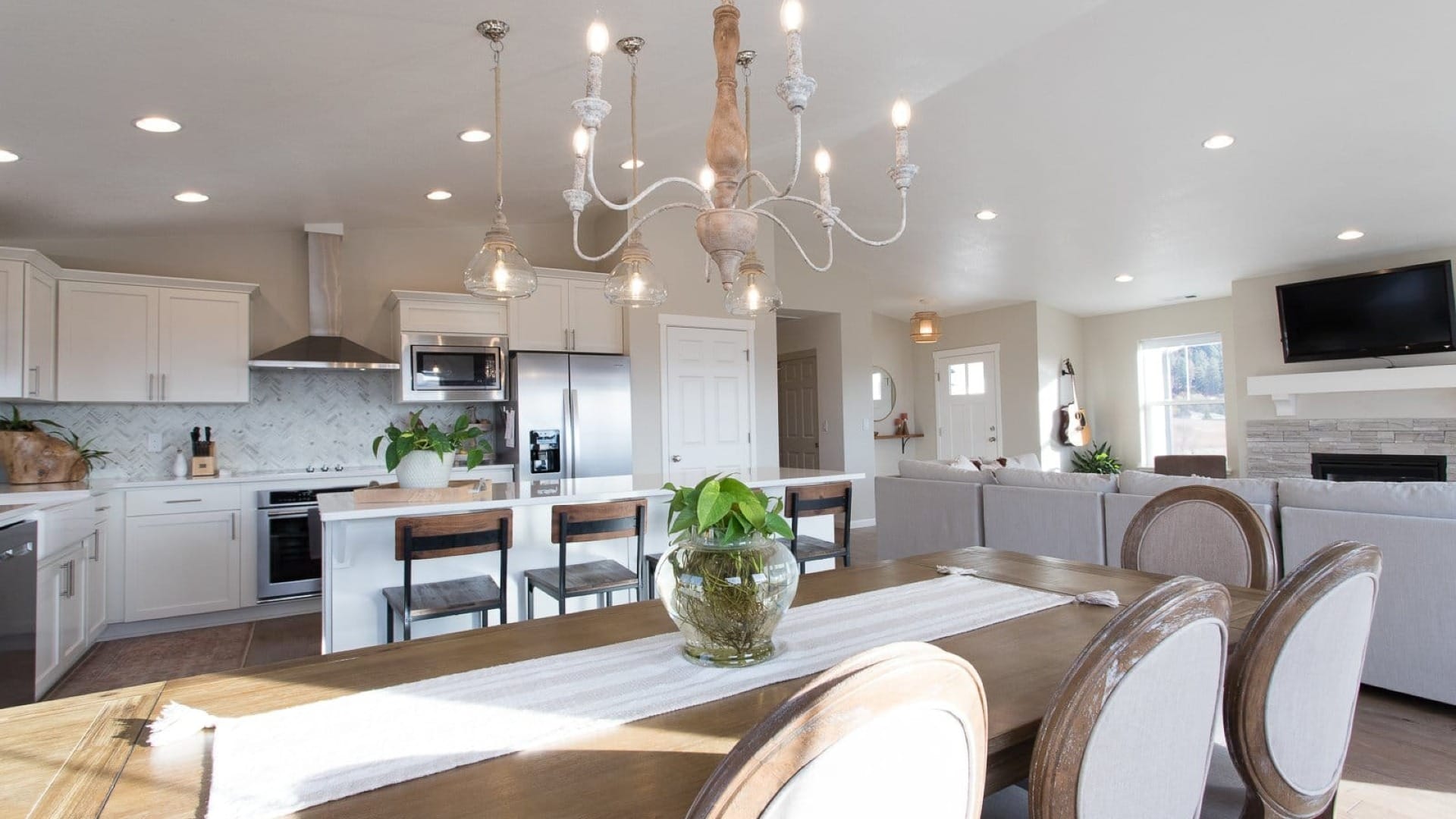A beautiful modern style kitchen with marble and wood accents