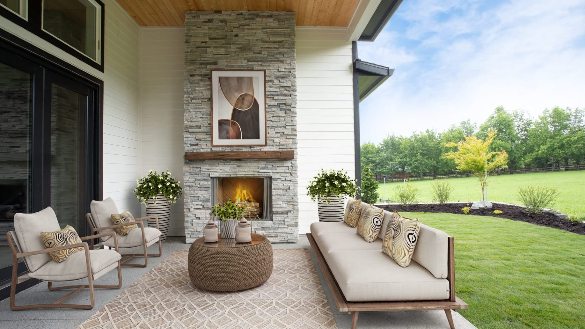 A backyard outside seating area with a fireplace