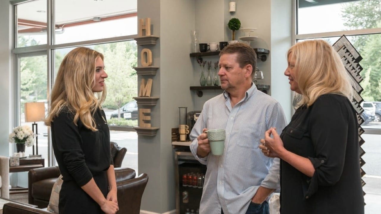 Adair team member discussing financing offer with potential home builders