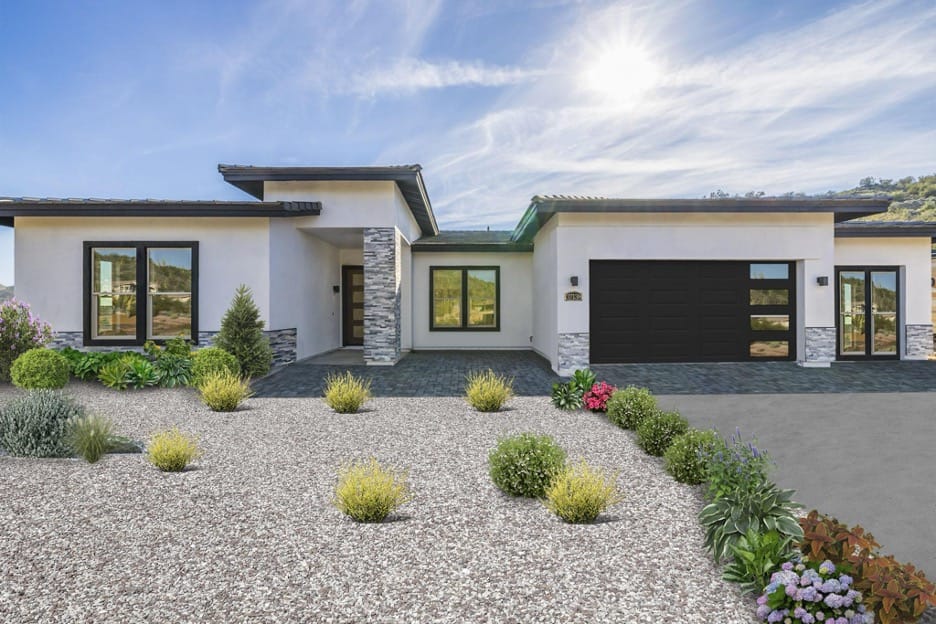 front view of a white modern home with black room in Arizona by Adair homes