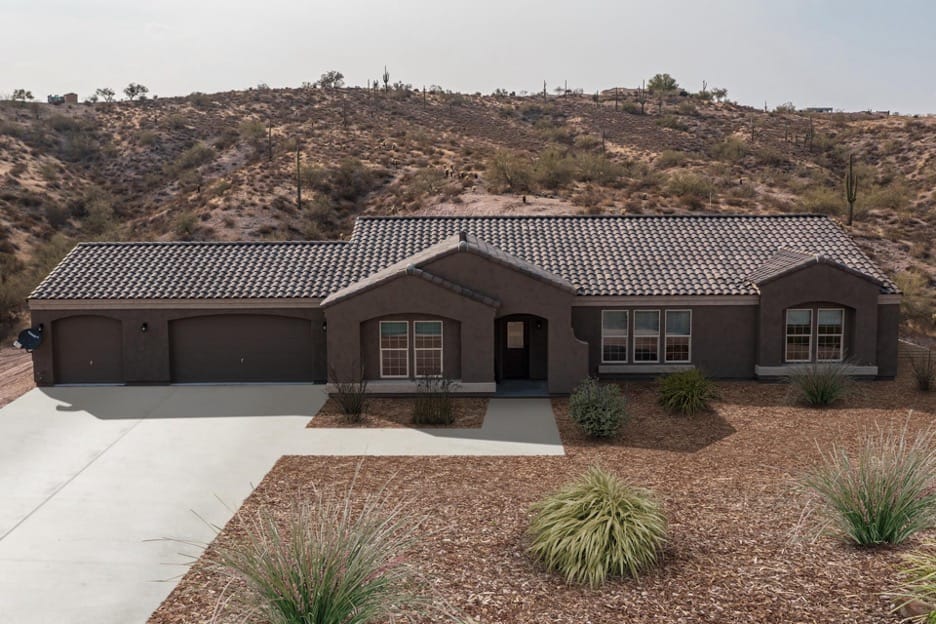 front view of a light brown home in Arizona made by Adair homes