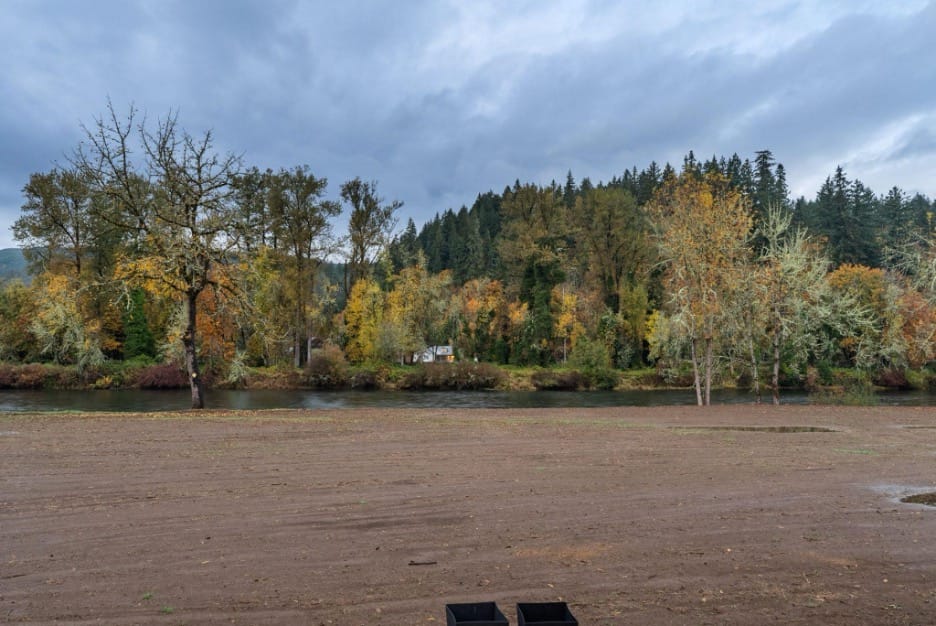 ground view of empty plot where Adair Homes will build a custom home