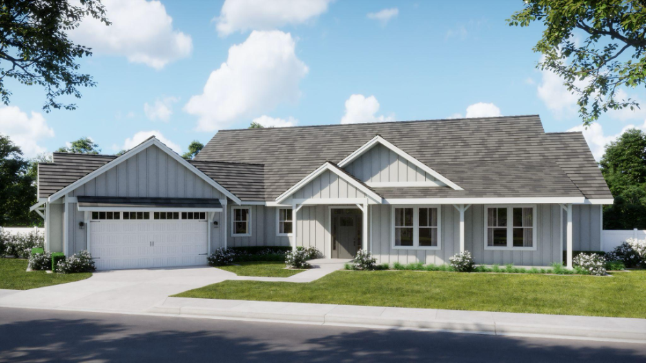 Exterior view of a single-level farmhouse-style custom home by Adair Homes, featuring a front porch, gabled rooflines, and a two-car garage.