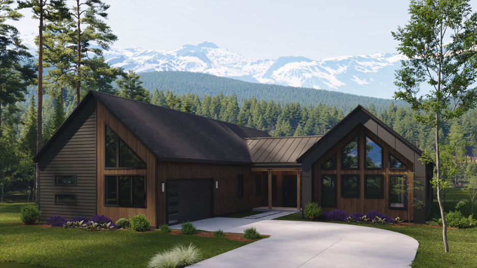 Modern mountain style home with dark wood exterior, large windows, and forested landscape with snow capped mountains in the background.