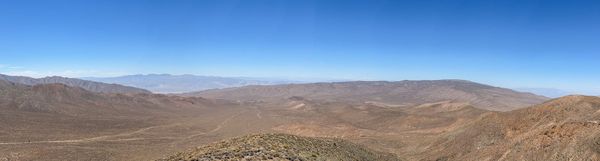 The view from the upper workings of the Bald Peak Mine looking northwest over Pinto Peak and into the Cottonwood Mountains.