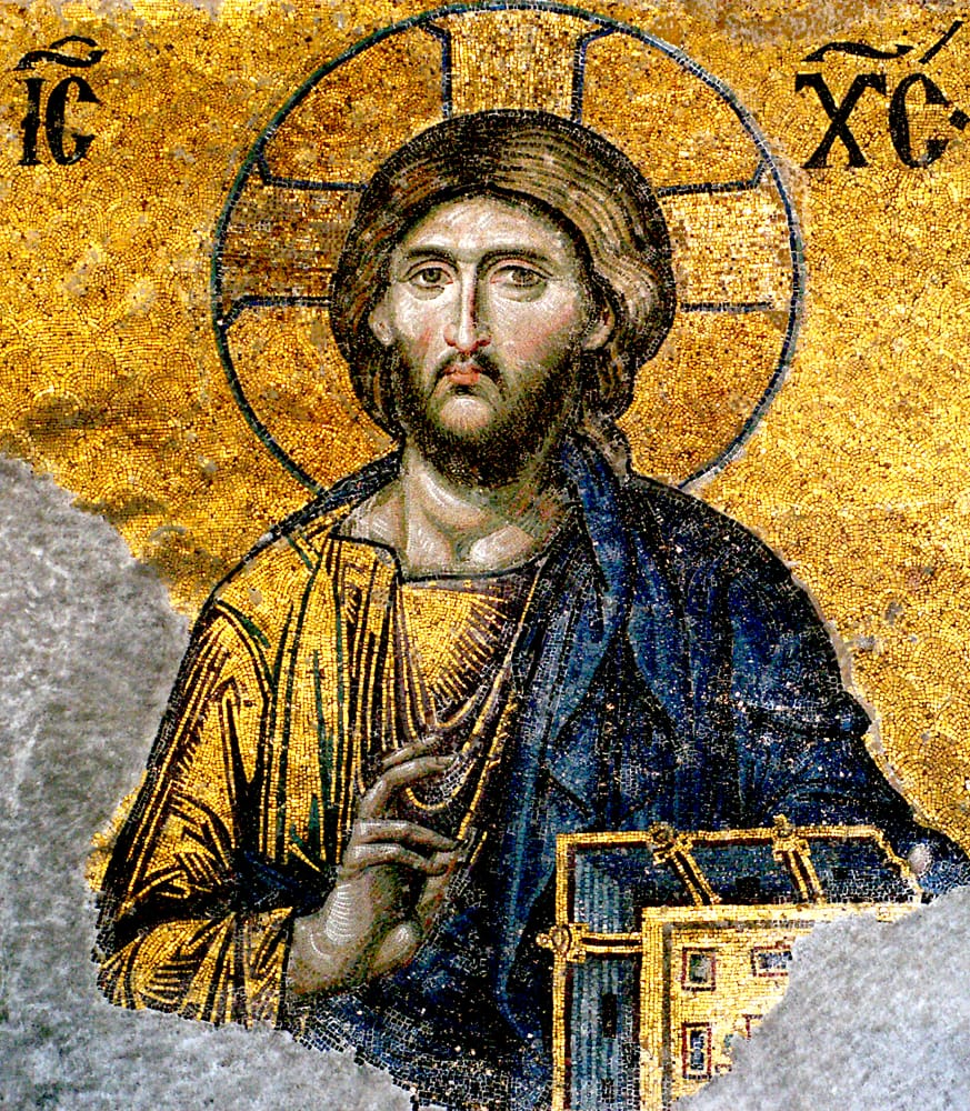 A gold Byzantine mosaic of Christ with a cross-marked halo and the Greek monograms IC and XC at upper left and right; the Deësis of Hagia Sophia.