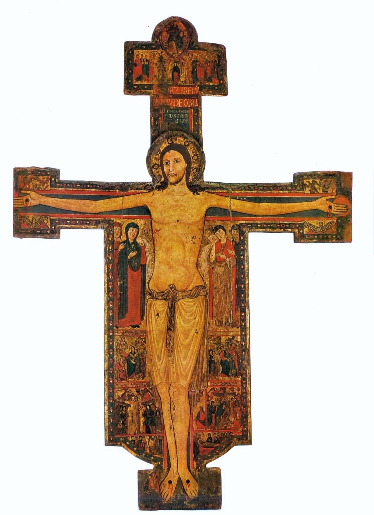 Twelfth-century Italian painted crucifix showing Christ alive on the cross with open eyes and an upright posture, haloed, flanked by small narrative scenes and by mourning figures at the arms of the cross.