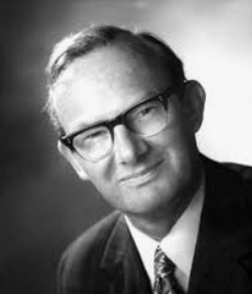 Photographic portrait of philosopher John Hick, an elderly man in glasses.