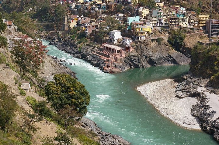 Two rivers meet with obvious different colors and flows.