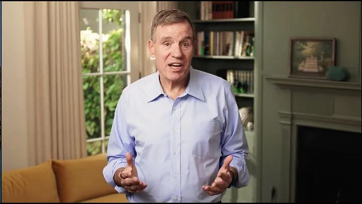 Warner announces reelection bid, proposes tech companies help fund AI job losses