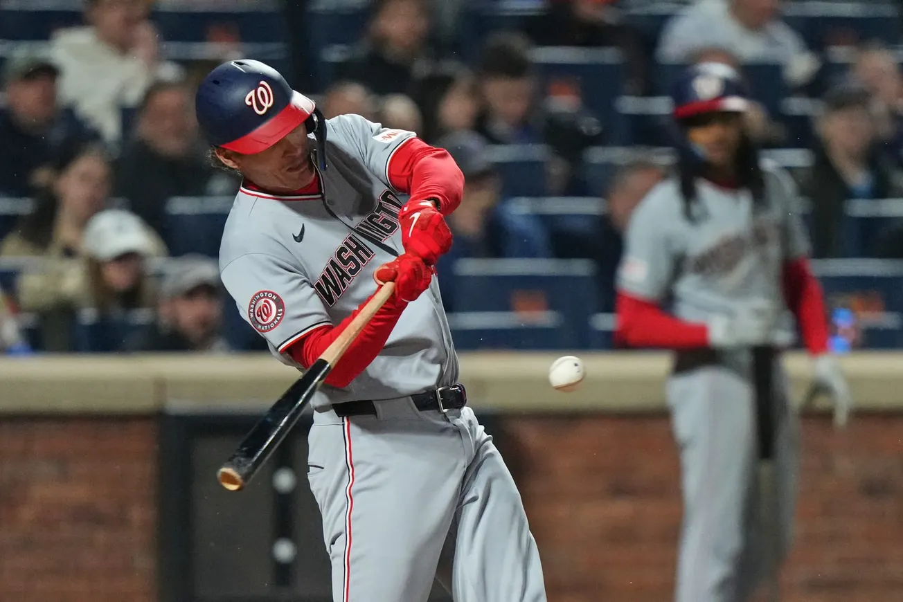 Brady House hits a grand slam and the Nationals blow out the staggering Mets 14-2 in the rain