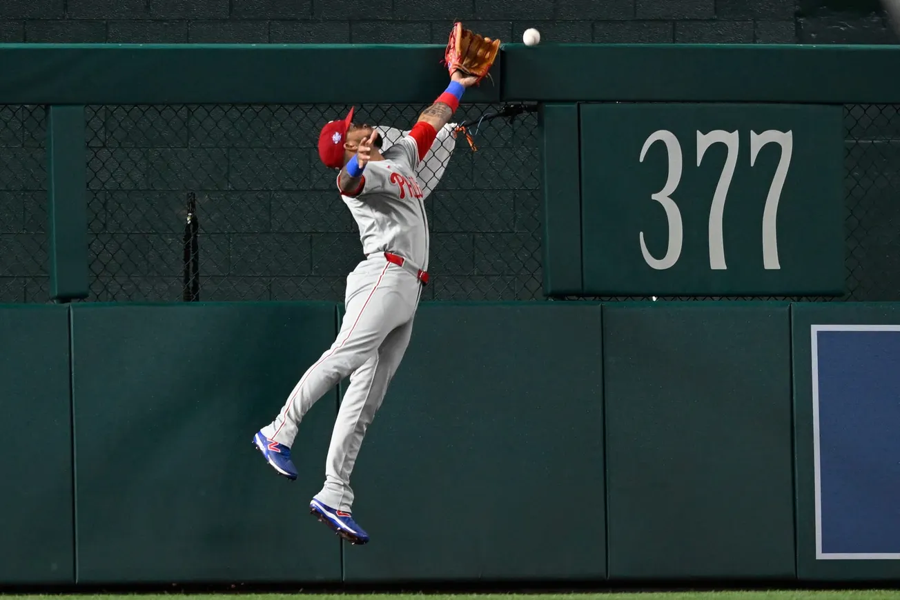 Phillies score 8 runs in the ninth inning and rally past the Nationals 14-9