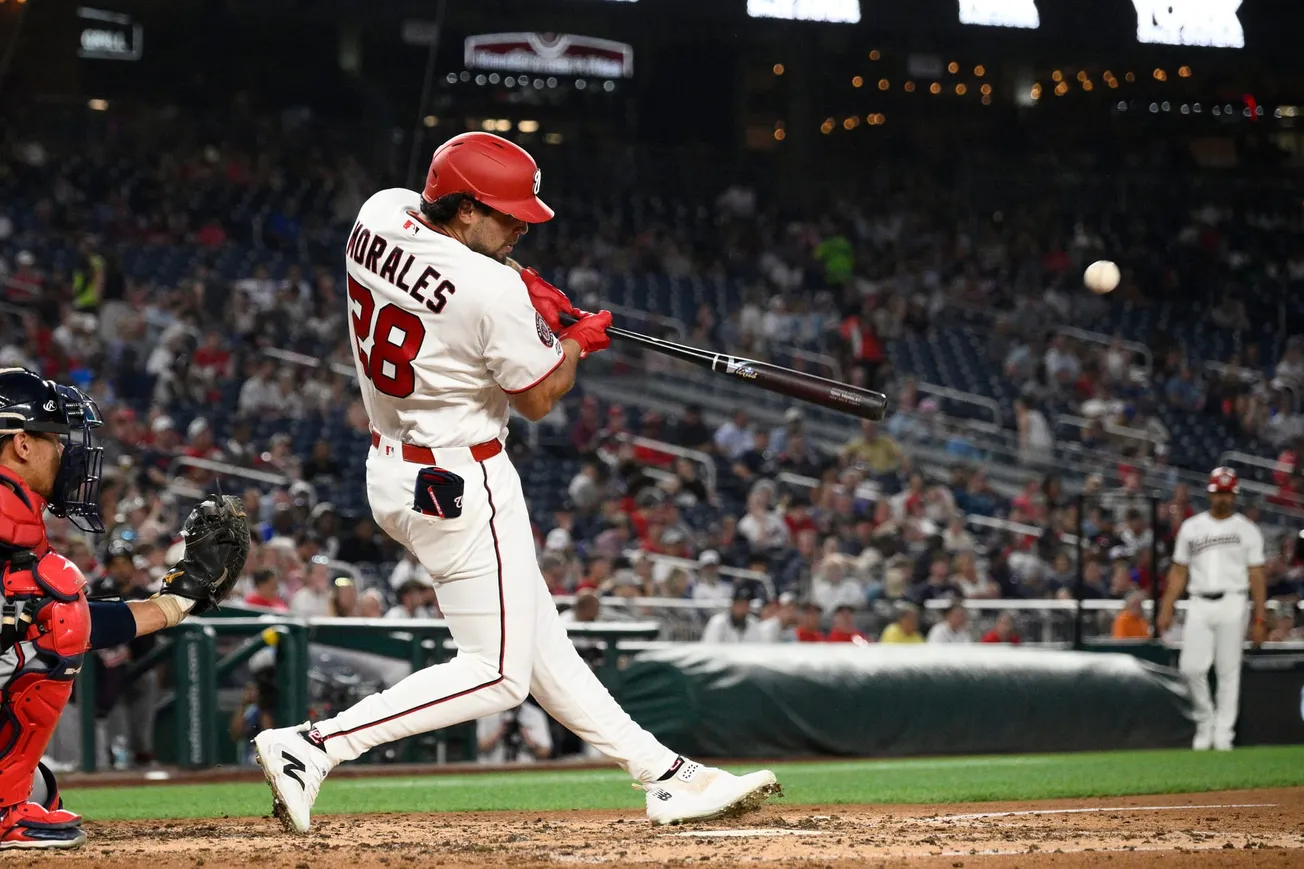 Yohandy Morales homers and has 3 hits in his debut as the Nationals top the Braves 9-5