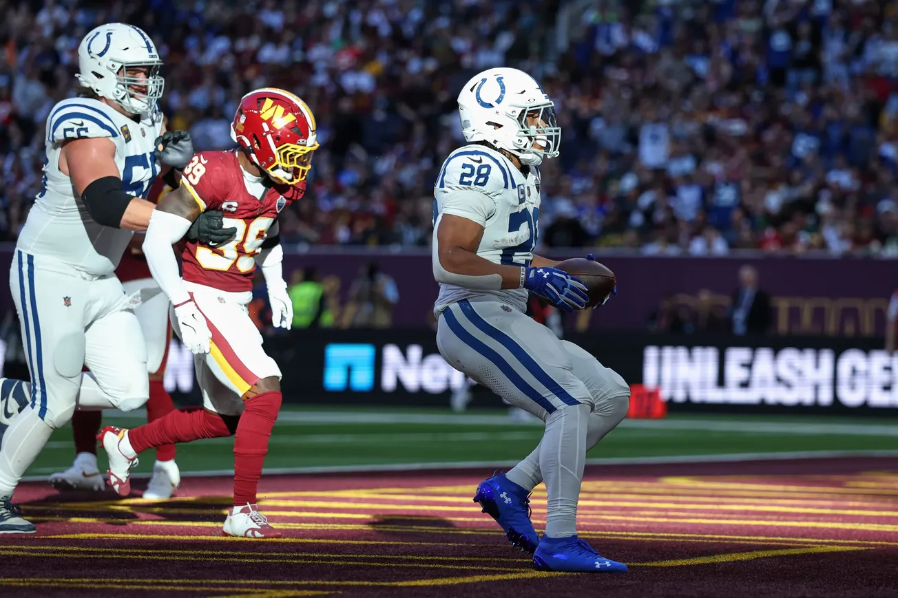 Taylor runs for 2 TDs and Colts beat Commanders 30-13 in London