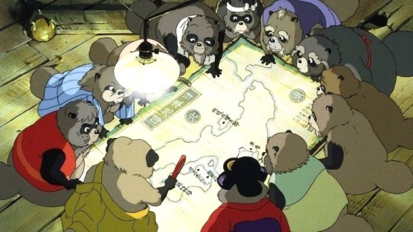 A group of tanuki studying a map