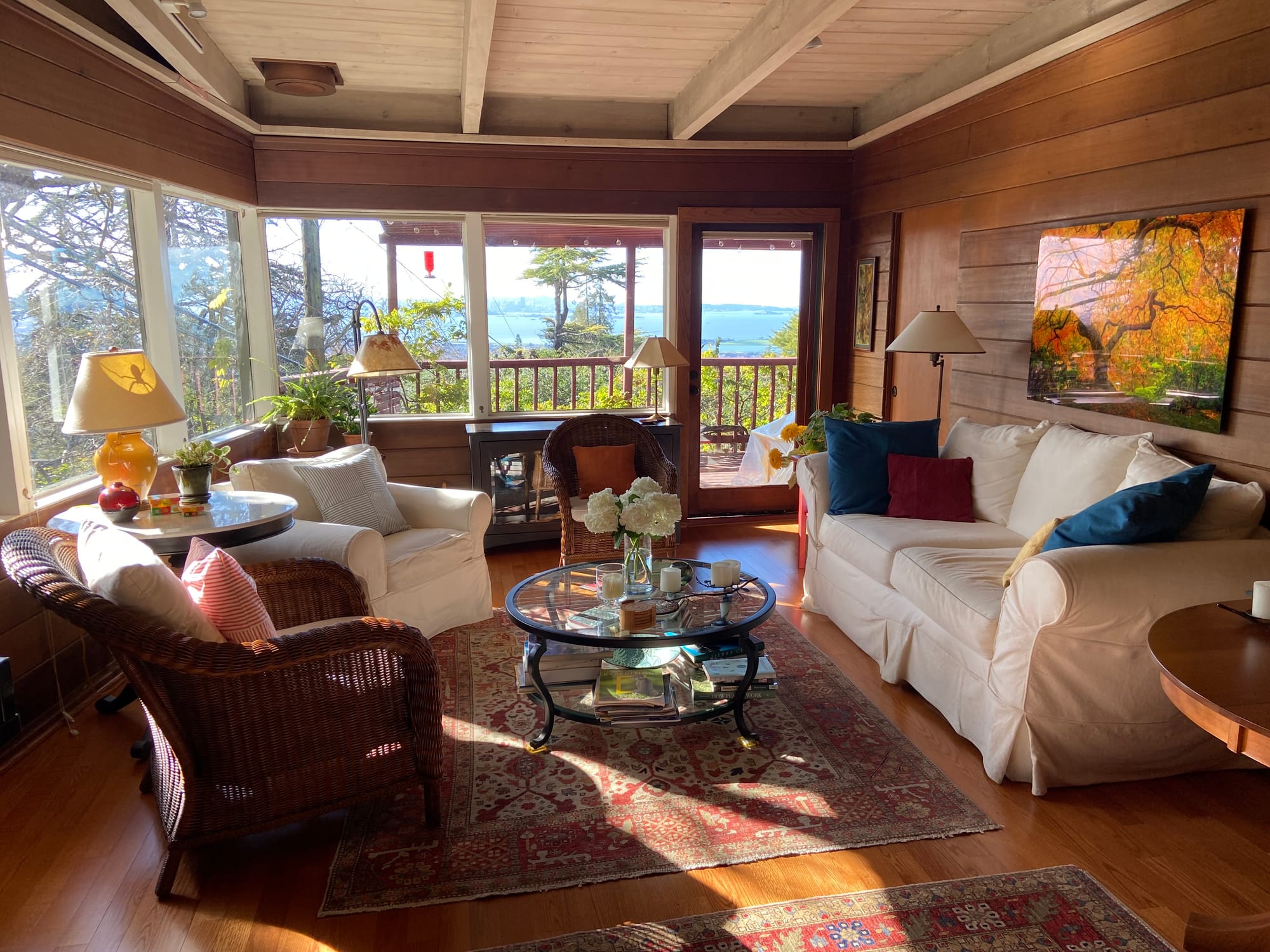 Large Japanese maple fine art canvas print installed in Australian coastal living room, Enchanting Tree of Life photographed at Portland Japanese Garden