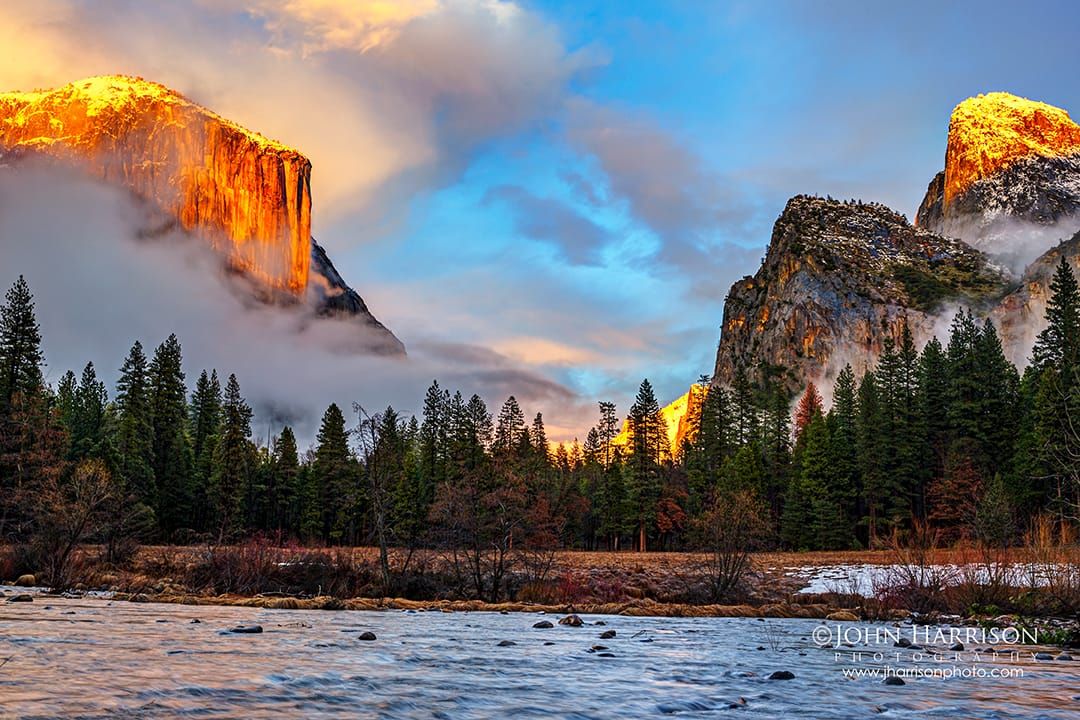 Yosemite Winter Itinerary: El Capitan glowing at sunset during a clearing storm at Tunnel View.