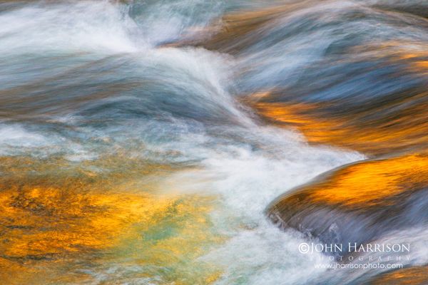 Abstract long exposure of the Merced River at sunset in Yosemite National Park, golden light reflecting on flowing water, Yosemite fine art wall art photograph