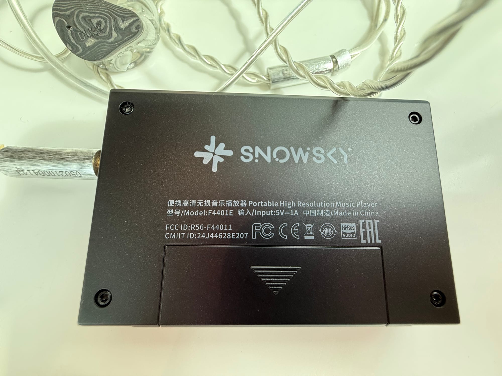 The rear of the Echo Mini showing the fake battery cover that does nothing