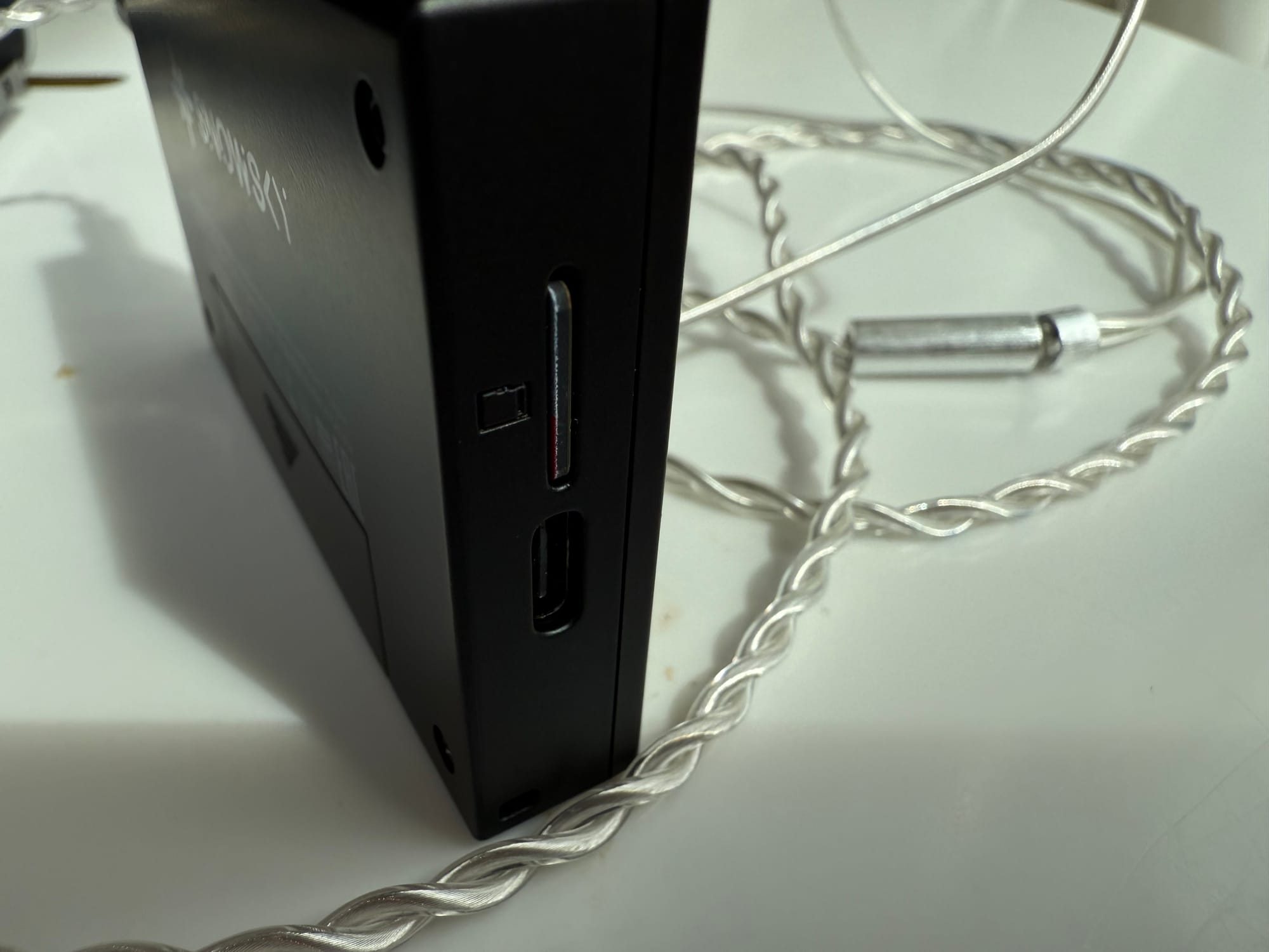 The left side of the Echo Mini showing the MicroSD card reader and USB-C port