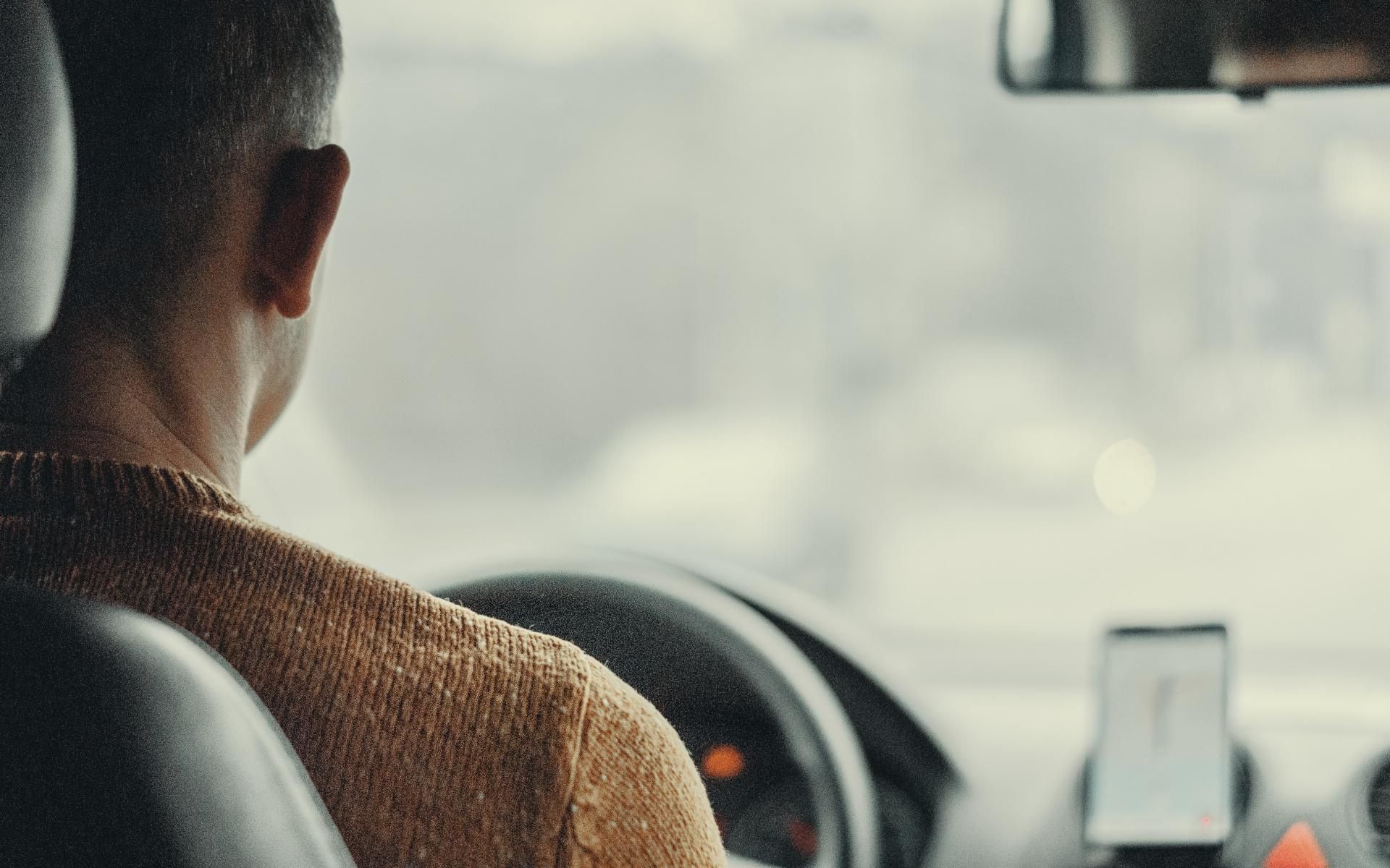 driver looking out the windscreen of a vehicle