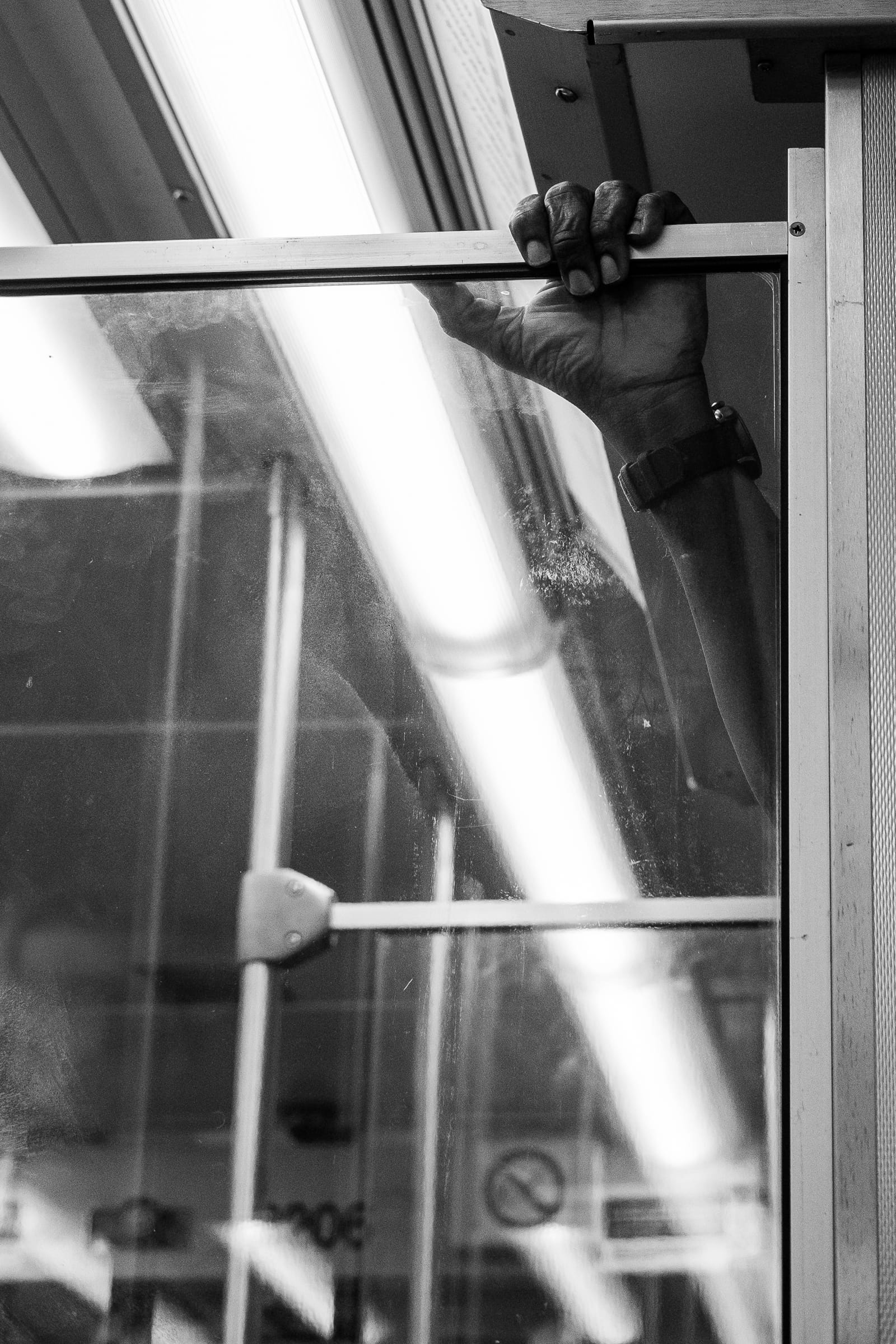 2018: Holding on.  Taken on the Brown Line train between the Loop and Belmont in Chicago