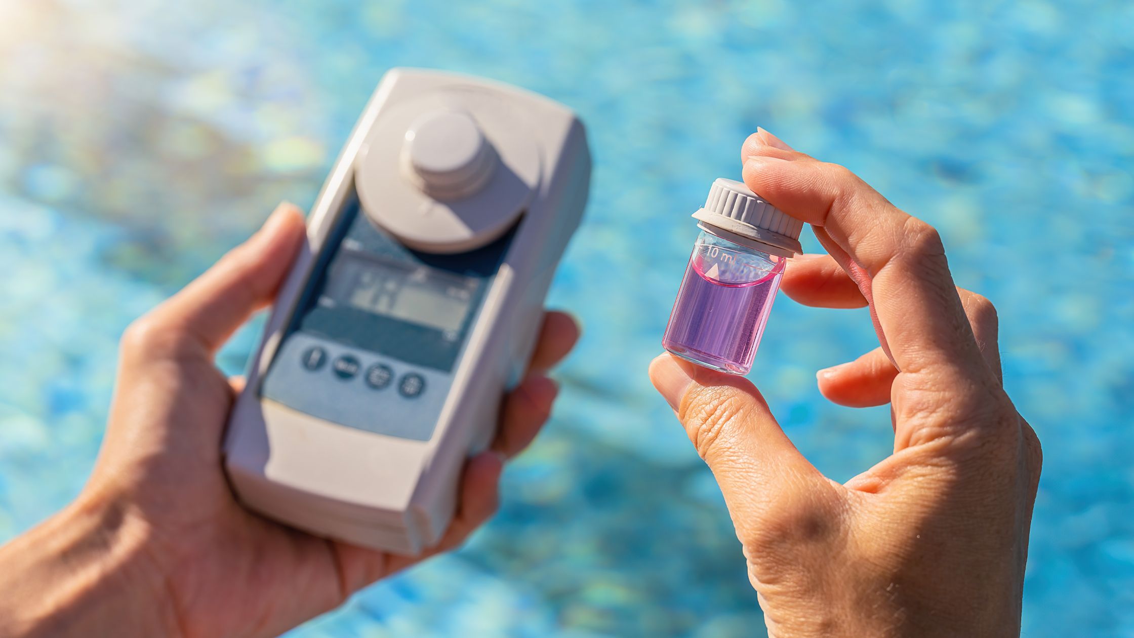 Testing pool water pH levels with a digital meter