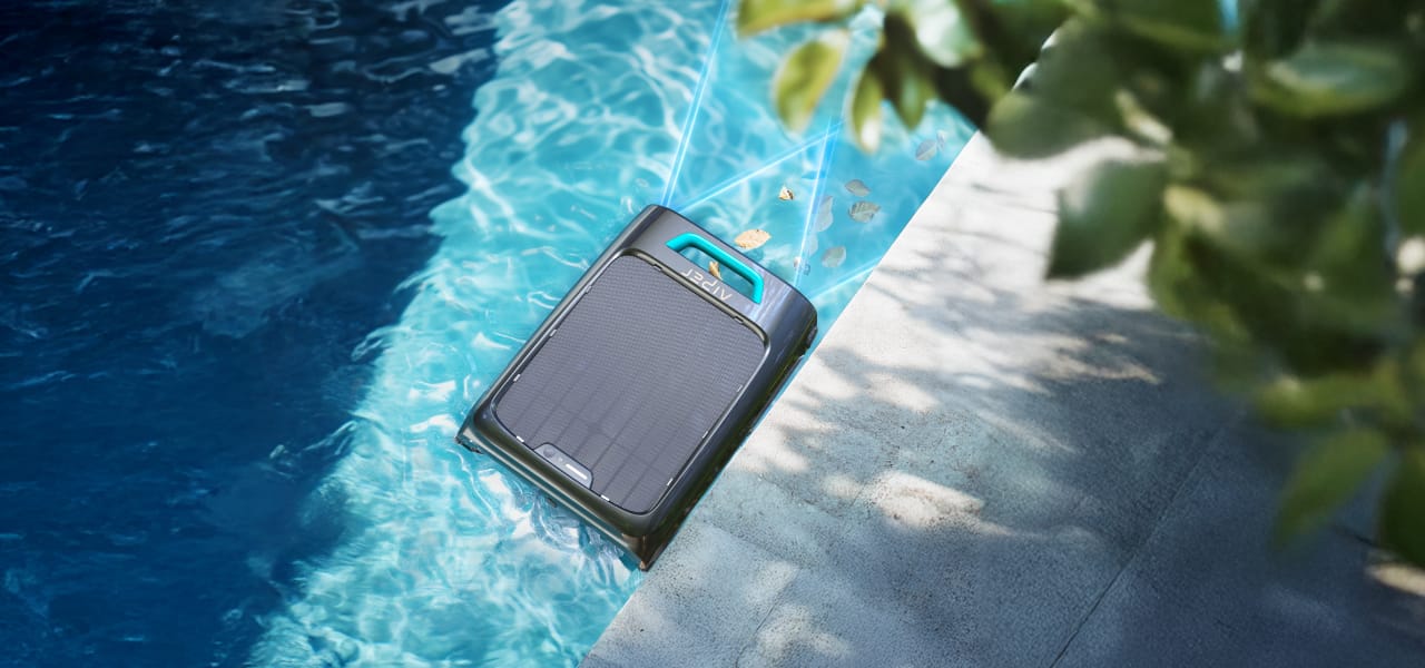 Aiper Surfer S2 cordless robotic pool skimmer removing leaves and debris to keep pool water clear in fall.