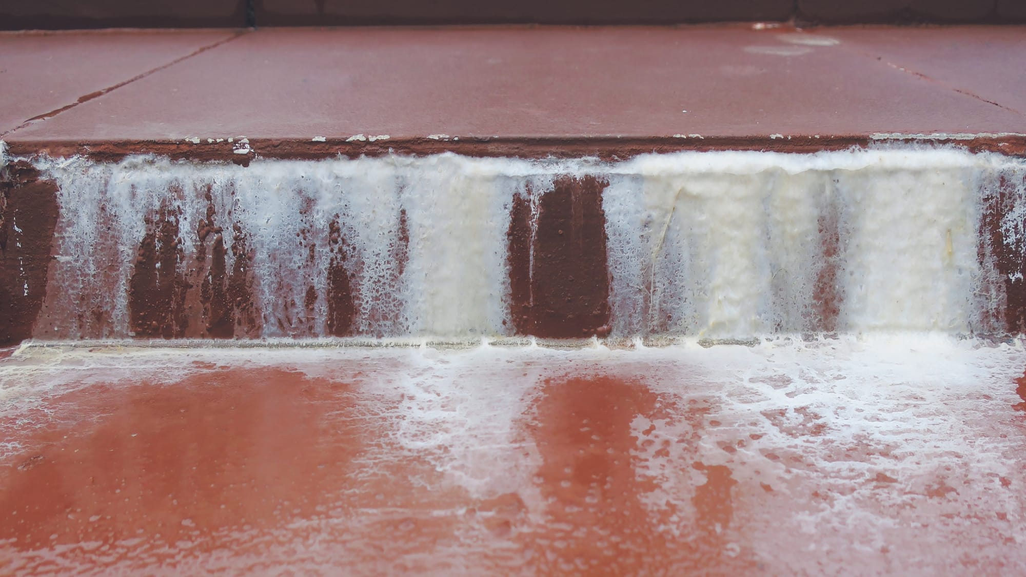 white, crusty deposits on your pool surfaces and tile line.