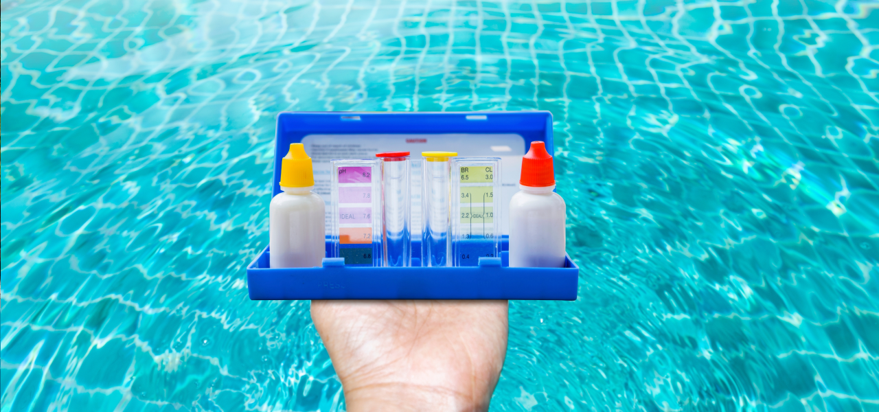 Checking pool water chemistry with a test kit to identify high phosphate levels.