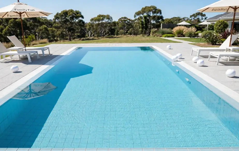 Spotless Australian backyard pool with no manual cleaning effort required, showcasing the results of using a robotic pool cleaner.