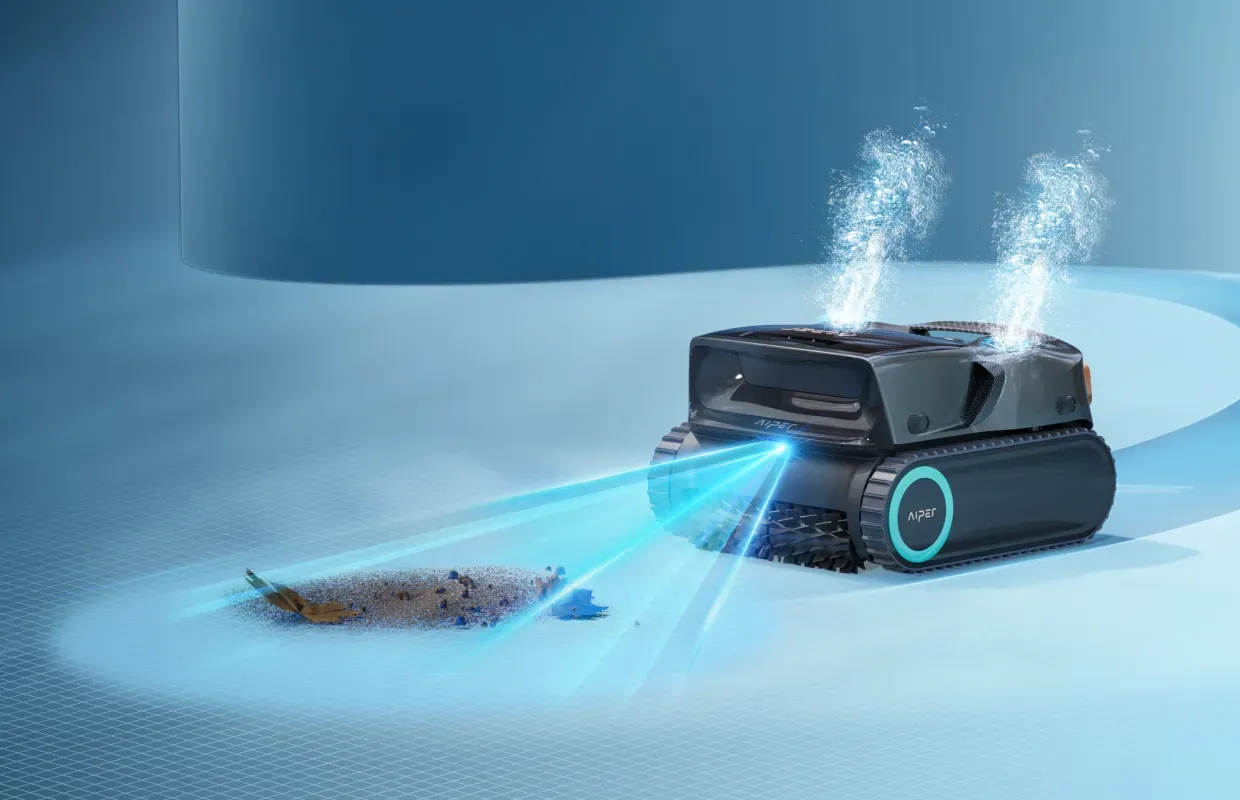 A cordless robotic pool cleaner performs precision cleaning on a crystal-clear swimming pool floor.