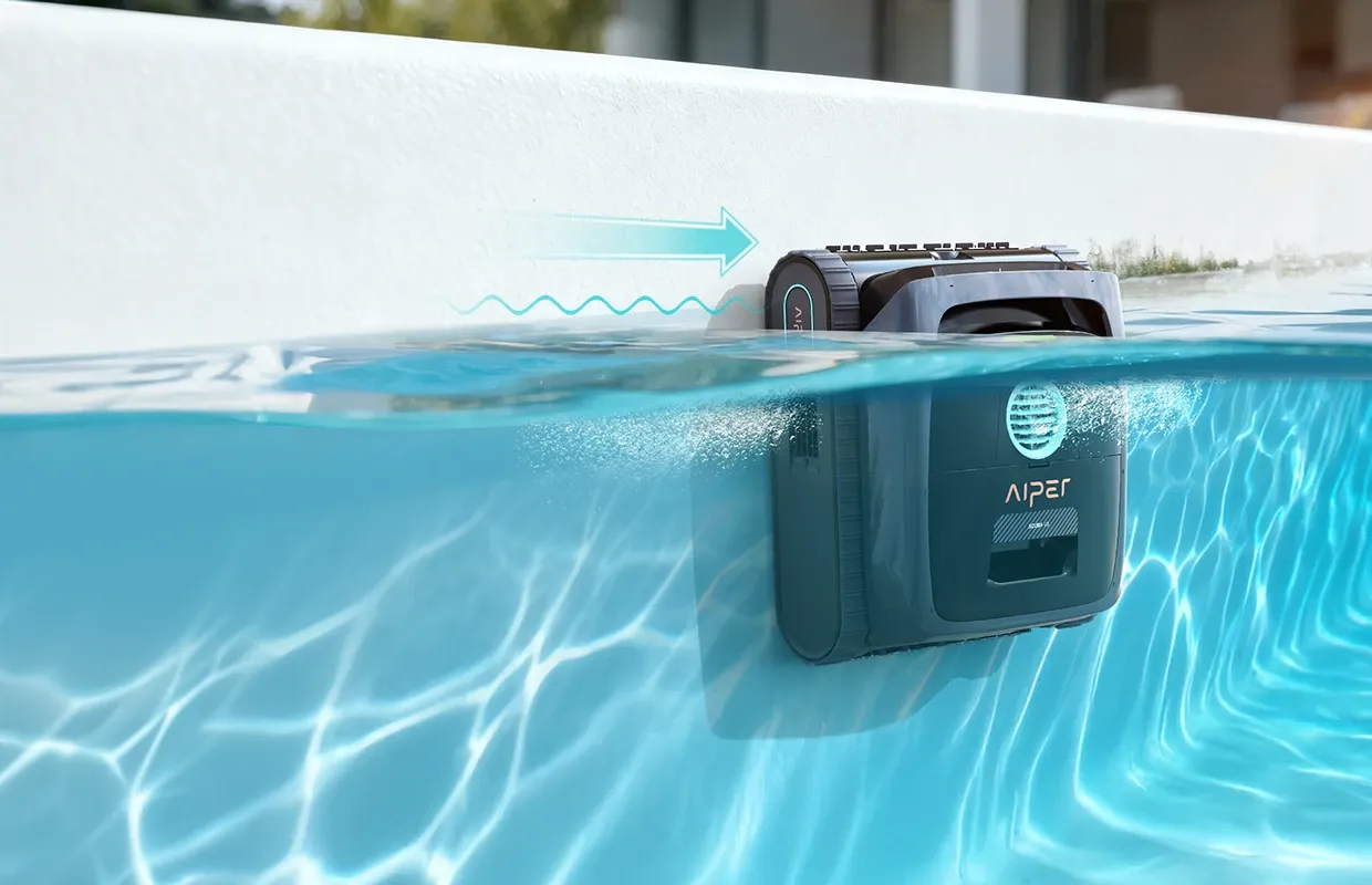 Aiper Scuba V3 robotic pool cleaner using AI path planning to scrub pool wall and waterline for full coverage.