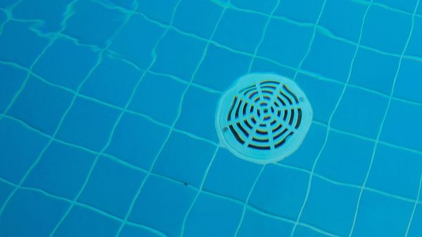 Floor drain at the bottom of the swimming pool.