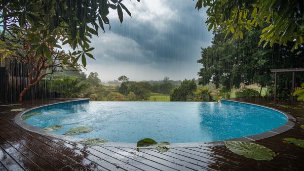 Does Rain Lower or Raise PH in Pool Water and How to Manage It