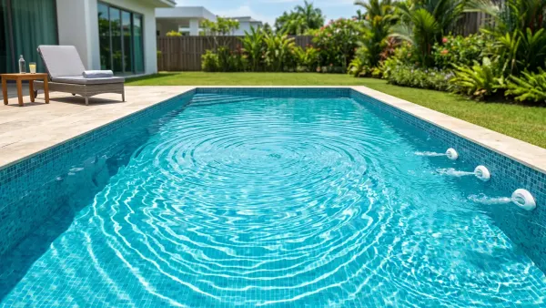 Adjusting pool return jets to create perfect water circulation and a crystal-clear swimming pool.