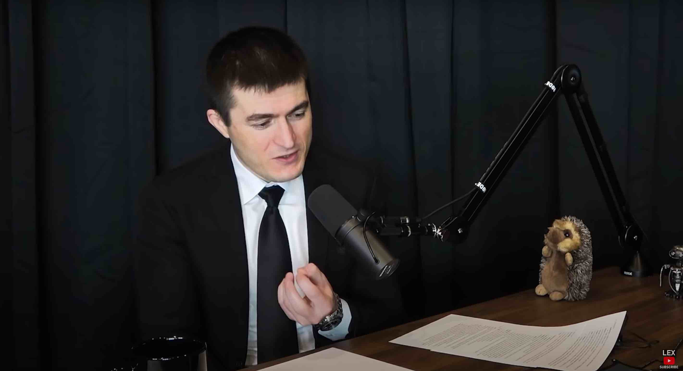 A photo of Lex Fridman recording a podcast episode.