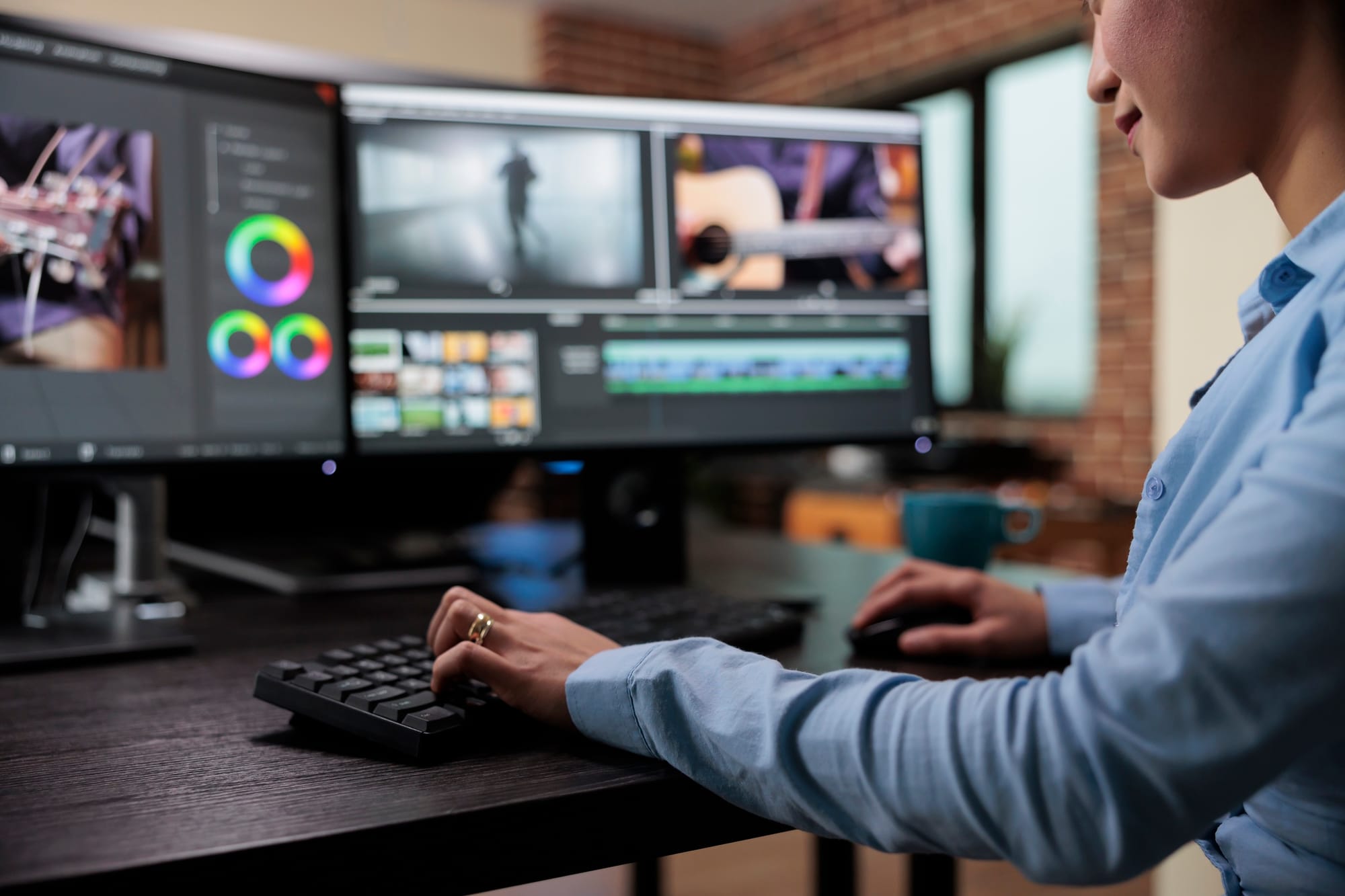 Person doing post-production on computer set-up