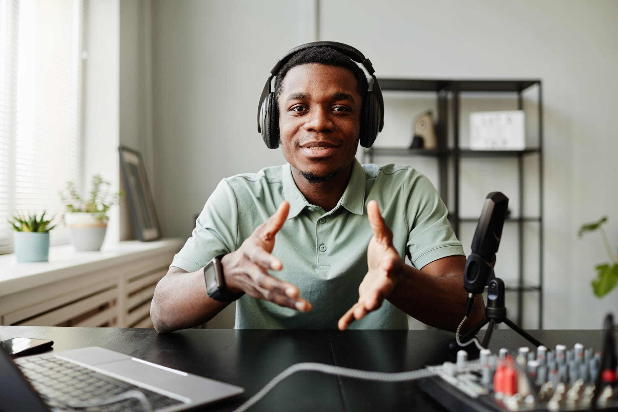 Podcast host talking and looking directly at the camera